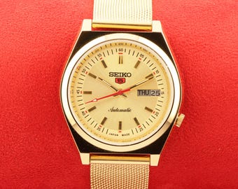 Montre-bracelet vintage Seiko 5 automatique, date du jour, cadran doré, Japon, remise à neuf