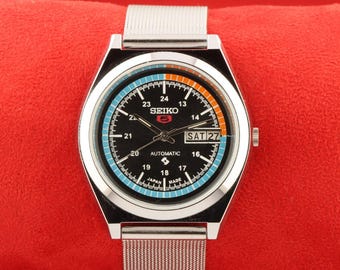 Montre-bracelet automatique vintage Seiko 5, date du jour, cadran noir, Japon, remise à neuf