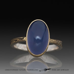 Mokume Gane 18K Yellow Gold and Blackened Sterling Silver Bow Tie Ring with Oval Chalcedony