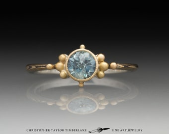 Mokume Gane 18K Yellow Gold and Sterling Silver Ring with Round Rose Cut Blue Montana Sapphire with Granulation