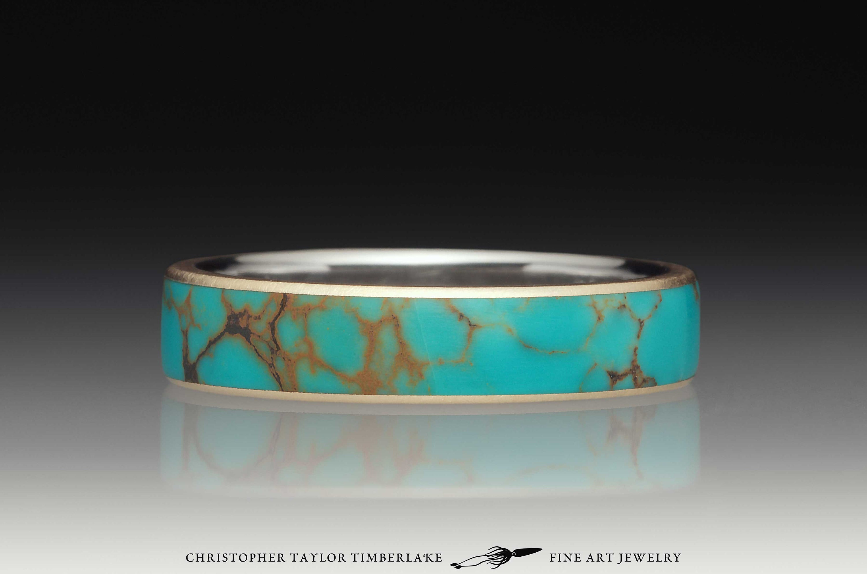 Gold ring with turquoise inlay deals