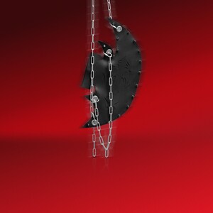May include: A black leather crescent moon-shaped bag with silver chain straps hanging from the top.