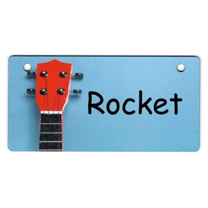 Guitar on Blue Design Crate Tag Personalized with Your Dog's Name