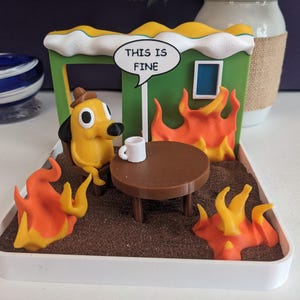 This Is Fine Dog Meme Zen Garden – 3D Printed Meme-Inspired Desk Toy with Flames, Brown Sand, and Rake