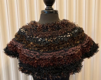 Short black and brown hand-knitted mini poncho / capelet in acrylic novelty yarns (sku #2022-I-26)