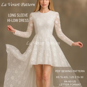 May include: A white long-sleeve hi-low dress with floral embellishments. The dress features a round neckline and a flowing skirt that is shorter in the front and longer in the back. The image includes text that says "La Verart Pattern" and "PDF Sewing Pattern".