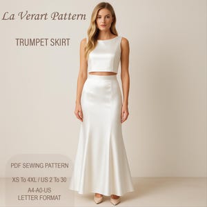 May include: A white satin trumpet skirt sewing pattern for sizes XS to 4XL, US sizes 2 to 30. The pattern is available in A4 and A0 sizes and is in letter format. La Verart Pattern.