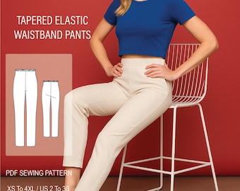 May include: A woman wearing a blue crop top and cream-colored tapered elastic waistband pants. The image includes a PDF sewing pattern with the text "La Verart Pattern" and "TAPERED ELASTIC WAISTBAND PANTS". The pattern is available in sizes XS to 4XL.