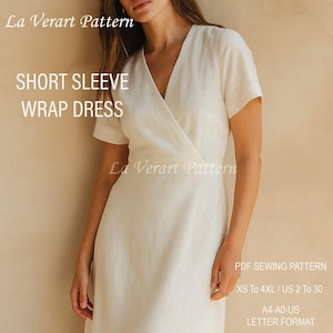 Könnte beinhalten: Ein weißes Wickelkleid mit kurzen Ärmeln. Das Kleid hat einen V-Ausschnitt und ein Wickeldesign. Der Text "SHORT SLEEVE WRAP DRESS" wird auf dem Bild angezeigt. Das Bild enthält auch den Text "La Verart Pattern" und "PDF SEWING PATTERN".