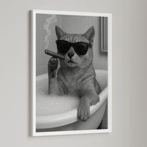 May include: Black and white framed print of a cat in a bathtub wearing sunglasses and smoking a cigar. The cat is surrounded by bubbles, with smoke rising from the cigar. The image has a humorous and relaxed theme.