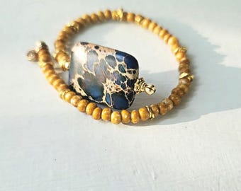 Beaded Caramel Flexible Cuff Bracelet with Deep Blue Accent: Jean
