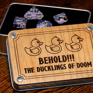 Behold !!! The Ducklings of Doom box and dice set, Transparent with light purple duck inside, Role Playing games dice, dungeons and dragons