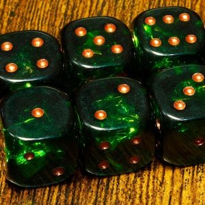 May include: A set of six translucent dark green dice with rounded corners and metallic copper-coloured pips. The dice are arranged in a cluster, showcasing their deep emerald hue and the reflective quality of the polished resin material.