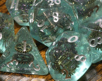 Sunken Artifact Dice Set – Steampunk with Gear Inclusions, Transparent with Glitters, TTRPG Game Kit for DnD and Role-Playing Games