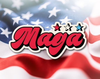 May include: A sticker with the word "Maga" in red, retro-style lettering, outlined in black, and three stars above it, one red, one white, and one blue. The sticker is set against a blurred American flag background.