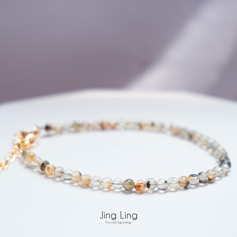 Golden Rutilated Quartz Dainty Beaded Bracelet & Crystal Meaning
