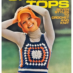 May include: A vintage crochet pattern booklet featuring a woman wearing a colorful crochet top with a white crocheted hat. The cover text reads "Shrink Tops Seven Styles To Crochet And Knit" and "leaflet 2543 35¢ columbia-minerva".