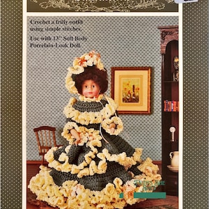 May include: A crochet pattern for a doll outfit called "Samantha". The pattern is for a frilly outfit using simple stitches. The pattern is for a 13 inch soft body porcelain-look doll.
