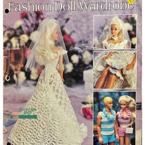 May include: A crochet pattern booklet for making doll clothes. The cover features a doll wearing a white crochet wedding dress and veil. The title of the booklet is "Hawaiian Honeymoon Fashion Doll Wardrobe".