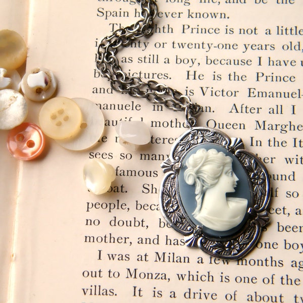 Patience.  classic slate blue and ivory cameo necklace