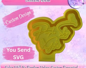 May include: A yellow silicone mold with the text "Purple Sky Gifts" in a cursive font. The mold is in the shape of a stylized design. The image also includes the text "Silicone Mold", "Custom Design", "You Send SVG", and "Color Will Be Random Unless Custom Requested".