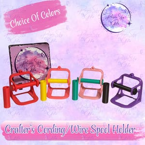 May include: Image features Crafter's Cording/Wire Spool Holders in red, yellow, green, pink, and purple. Each holder has a spool and a frame. The text "Choice Of Colors" is displayed above the holders.