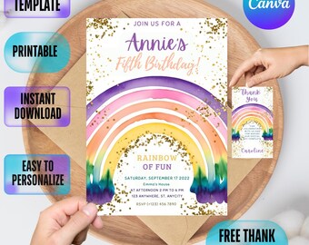 May include: A printable invitation for a fifth birthday party with a rainbow watercolor design and gold glitter. The invitation says "Join us for a Annie's Fifth Birthday! Rainbow of Fun" and includes the date, time, and location of the party. A free thank you tag is also included with a rainbow watercolor design and the text "Thank You".