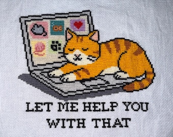 May include: Cross-stitch design featuring a tabby cat resting on a laptop. The laptop screen displays icons, and the text "LET ME HELP YOU WITH THAT" is below. The cat is orange and brown, and the laptop is gray.