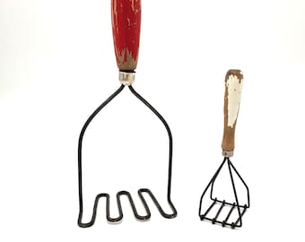 cute pair of antique hand wire mashers with wood handles