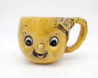 sweet 1959's vintage ceramic lemon face mug by Enesco