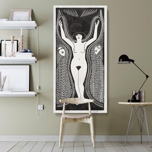 May include: Black and white woodcut print of a nude woman standing with arms raised, surrounded by stylized hair or water. The woman is wearing a hat and has a simple design on her body. Two stylized faces are visible on either side of the woman.
