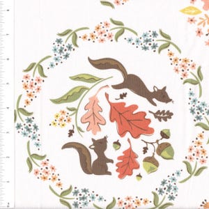 May include: A white fabric with a repeating pattern of squirrels, leaves, and flowers. The squirrels are brown and are jumping through the air. The leaves are red, orange, and green. The flowers are pink, blue, and yellow.