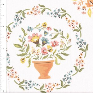 May include: A white background with a floral pattern. A terracotta pot with a bouquet of pink, yellow, and blue flowers is in the center of the design. The flowers are surrounded by a wreath of smaller flowers in shades of pink, blue, and yellow.