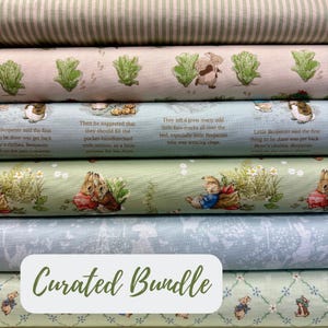 May include: A stack of fabric bundles featuring various patterns. Designs include green and white stripes, lettuce, rabbits, and text from a storybook. The bottom fabric has the words "Curated Bundle" in a white box.