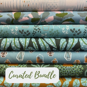 May include: A stack of fabric bundles with various botanical patterns in shades of blue, green, and orange. The fabrics feature designs of plants, leaves, and terrariums. The text "Curated Bundle" is displayed on a white rectangular label.