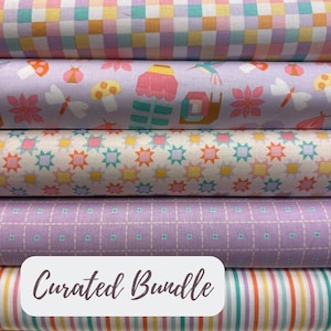 May include: A stack of colorful fabric rolls. The top roll features a checkered pattern in pastel colors. Other rolls display whimsical designs like mushrooms, dragonflies, and geometric shapes. The bottom roll has vertical stripes. The text "Curated Bundle" is on a white label.