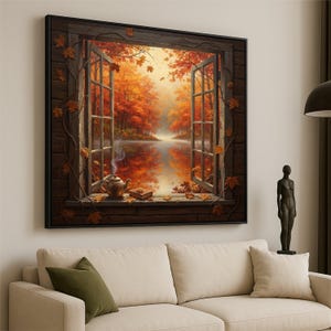 May include: A framed artwork depicts an open window overlooking an autumn landscape. The scene features vibrant orange and red trees reflected in a calm lake. A teapot and book sit on the windowsill, with falling leaves.