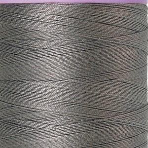 May include: A spool of gray Mettler Silk-Finish cotton mercerized thread. The spool is labeled "No. 50" and "500m/547 yds".