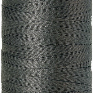 May include: A spool of gray Mettler Silk-Finish cotton thread, labeled "No. 50" and "500m/547yds".