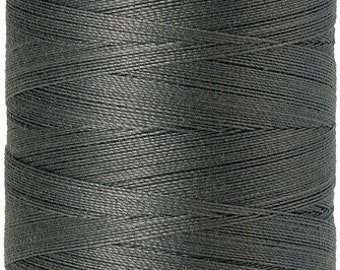 May include: A spool of gray Mettler Silk-Finish cotton thread, labeled "No. 50" and "500m/547yds".