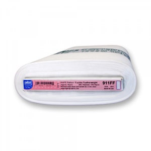 May include: A white roll of 911FF Pellon Fusible Featherweight interfacing for apparel. The label reads "911FF Pellon Fusible Featherweight Apparel-Basics 50% Polyester/10% Rayon Machine wash warm and tumble dry or dry clean www.PellonProjects.com 911FF 20 IN 2012 MADE IN USA"