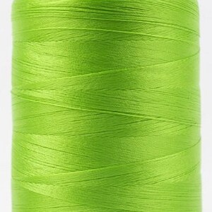 May include: A spool of bright green cottonized thread with a label that reads "Cottonized 40wt/3 poly grass green 3000yd".