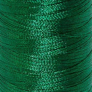 Puede incluir: Una bobina de hilo verde esmeralda.