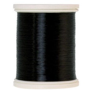 May include: A spool of black thread for sewing or embroidery.