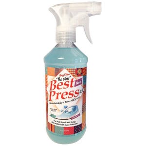 May include: A blue plastic bottle of Mary Ellens "The other" Best Press #2 fabric stiffener. The bottle has a white spray nozzle and a colorful label with the product name and instructions. The label says "Formulated for a firm, stiff press!" and "The Best Starch and Sizing Alternative with Stain Protection."