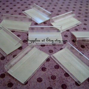Vente spéciale de WEEK 1000pcs Clear Plastic Lip Self-Adhesive 1 pouce Earring Card Adapters Lip Hang Tab pour Boucle d’oreille Spinner affichage