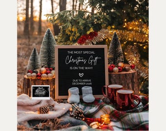 May include: A Christmas-themed pregnancy announcement. A black letter board with the text "THE MOST SPECIAL Christmas Gift IS ON THE WAY!" and "DUE TO ARRIVE DECEMBER 2026". The scene includes baby booties, mugs, and a sonogram image.