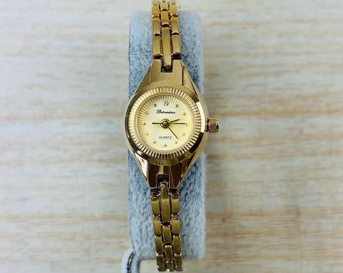 Ladies vintage inspired gold tone watch , stainless steel , water resistant , new