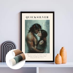 May include: A framed art print featuring a romantic illustration of a couple embracing. The artwork has a fantasy theme, with the word "QUICKSILVER" at the top. The print includes a quote at the bottom. The print is displayed on a white shelf.