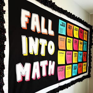 May include: A black bulletin board display featuring the large white text FALL INTO MATH with colorful drop shadows. To the right, a grid of small, brightly colored paper squares contains various fall-themed questions and math prompts.